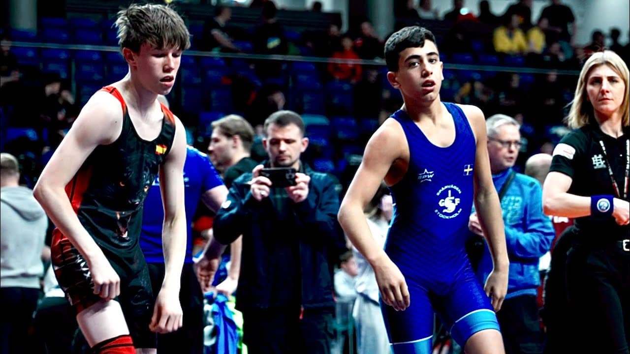 U13 Aleksandr Trakhtman (ESP) vs Leon Rahimi (SWE) 53kg. Greco-roman boys youth wrestling. C-cam-man