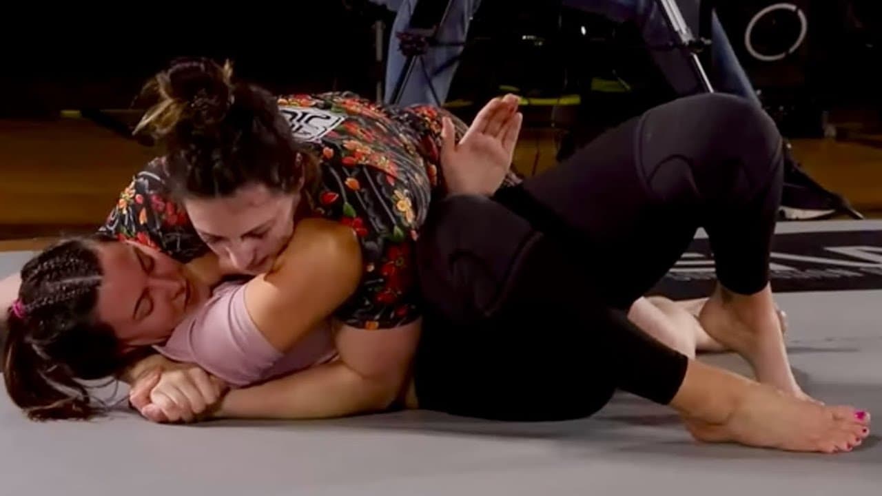 Andrea loses grapple match on the ground