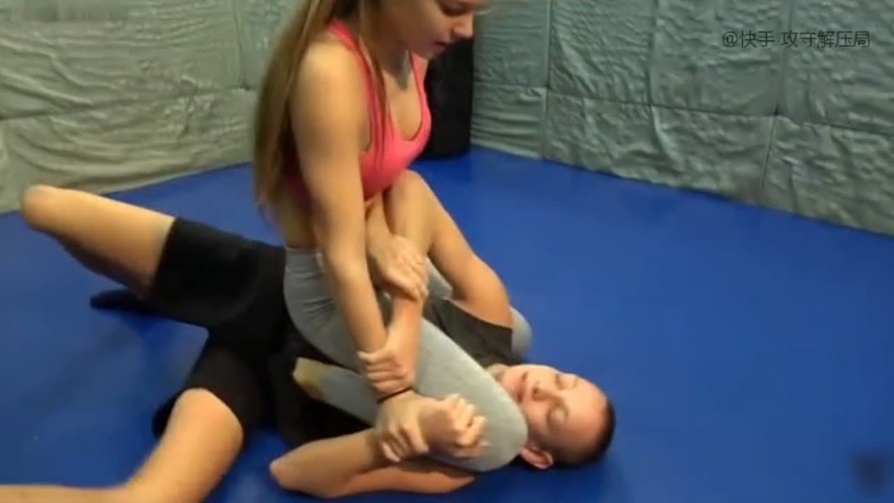 Girls Practicing Grappling Hold on Training Mat