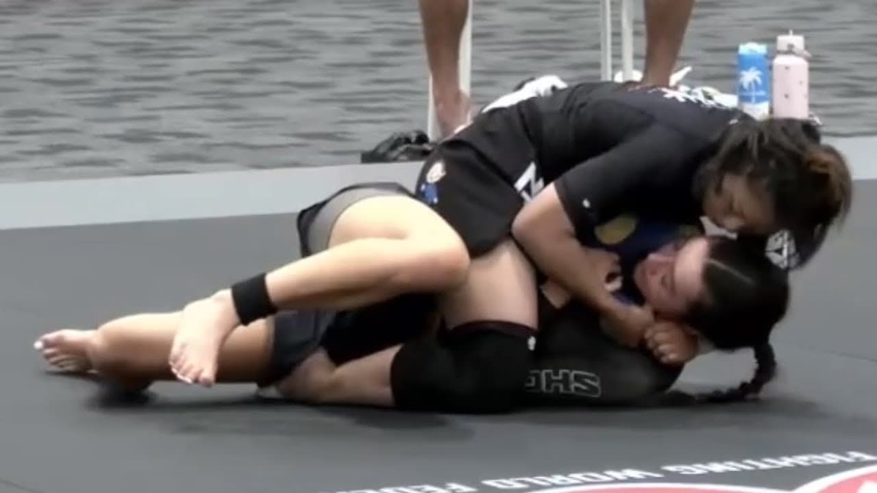Anya is pinned on the ground
